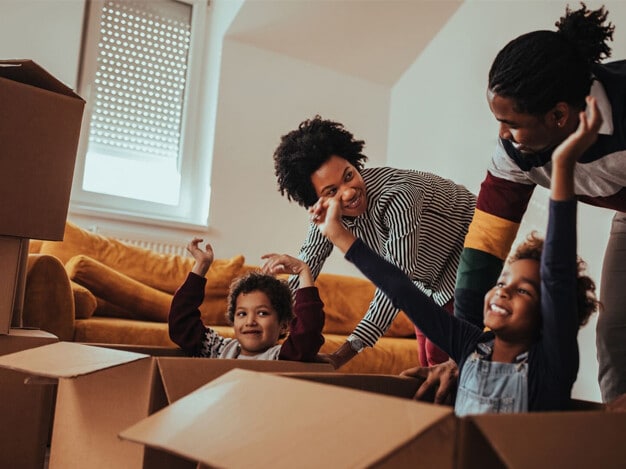 Helpful strategies to alleviate stress when moving houses with toddlers, including creating a moving day schedule, involving kids in the process, setting up a safe play area in the new home, and maintaining familiar routines to ease the transition.