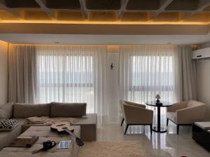 Stylishly designed studio apartment showcasing various layout options, including multifunctional furniture and creative space-saving solutions, illustrating how to maximize functionality and aesthetics in a compact living area
