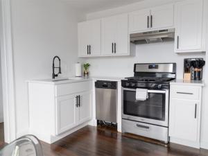 Creative small kitchen organization ideas featuring efficient storage solutions like wall-mounted shelves, drawer organizers, and space-saving appliances, designed to maximize functionality and keep the kitchen tidy.