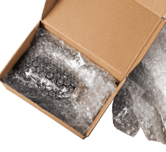 Close-up of bubble wrap and plastic sheeting, essential packing materials for moving, providing protective cushioning for fragile items and secure wrapping for furniture and belongings.