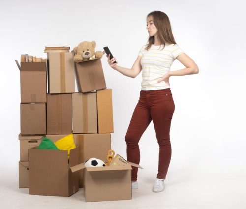 Old,Things,In,Boxes.,Girl,With,Boxes,On,Light.,Woman