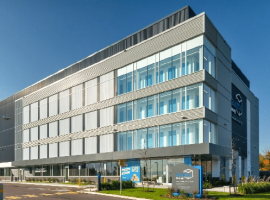 Exterior view of Vaultra Storage Ajax, featuring modern, secure storage facility located at 20 Pugsley Court, with ample parking and clean surroundings.
