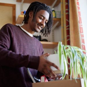 Male,University,Or,College,Student,Moving,Into,Campus,Room,Unpacking